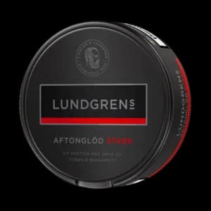 Lundgrens Aftonglöd Stark – dosan sedd snett framifrån, stark vit portion tobakssnus med läder och bergamott från BAT