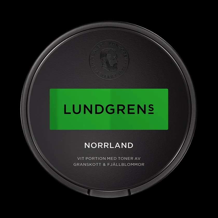 Dosa med Lundgrens Norrland, vit portion tobakssnus med granskott och fjällblommor från BAT